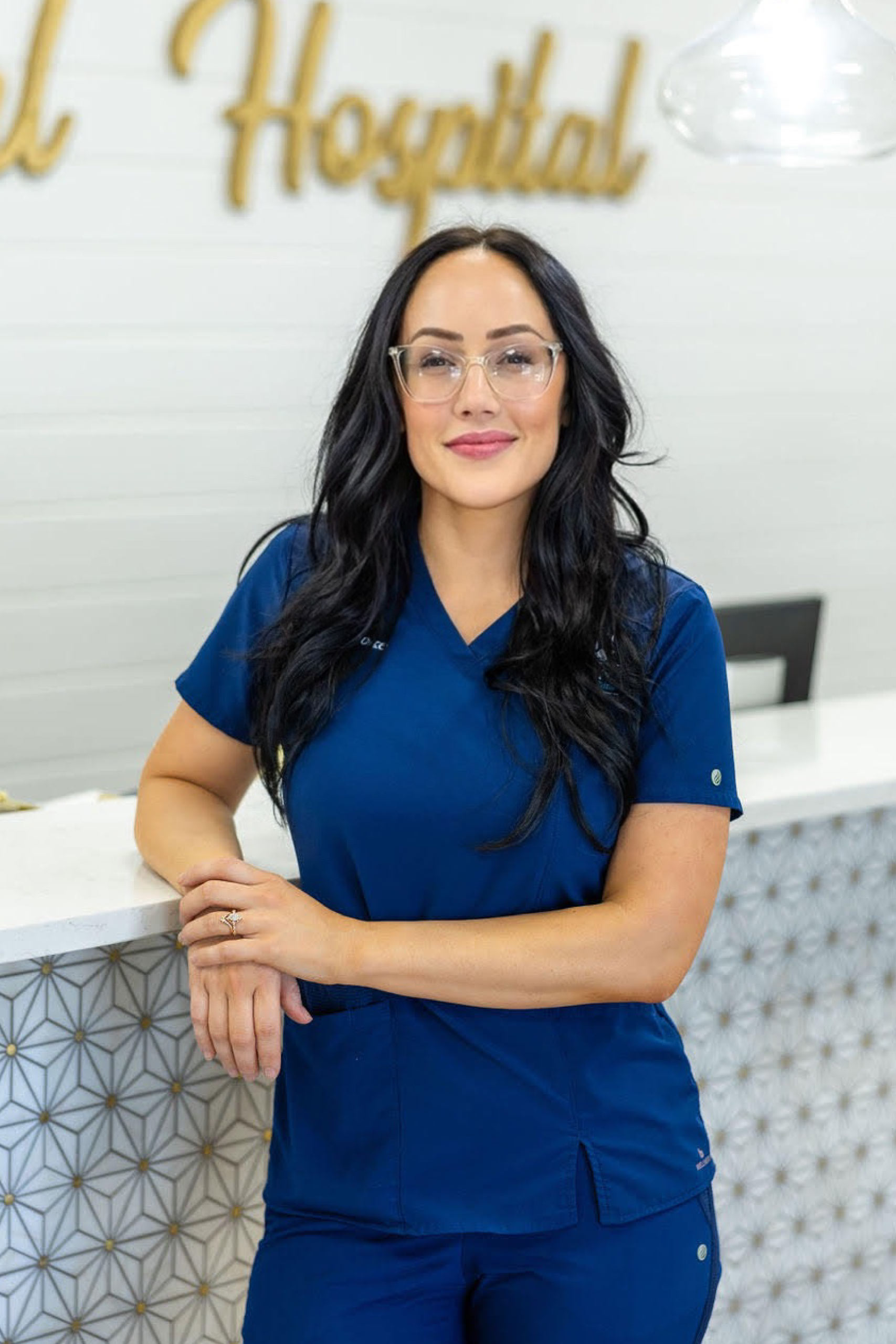 Brooke Runbino, a member of the Gardens Animal Hospital Management Team